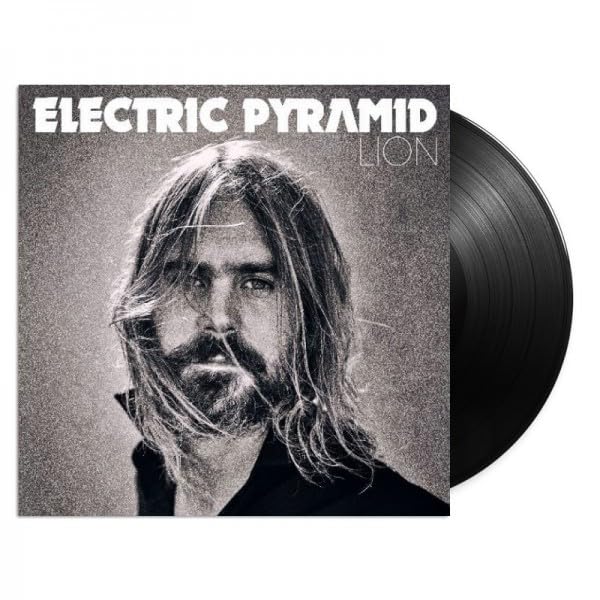 Black vinyl record with album cover featuring a grainy portrait of a man.
