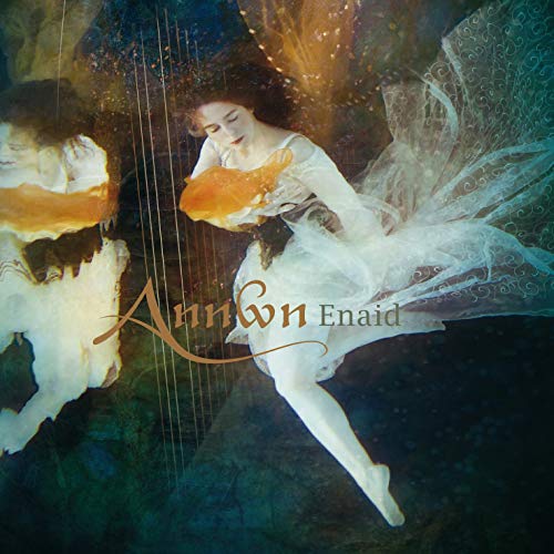 CD cover: woman in white dress with a golden fish and harp.
