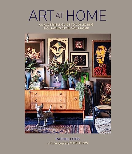 Book cover showing a gallery wall above a wooden sideboard with a dog statue.