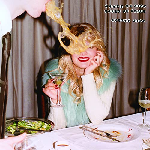 Woman with blonde hair and red lipstick, food being vomited near her.