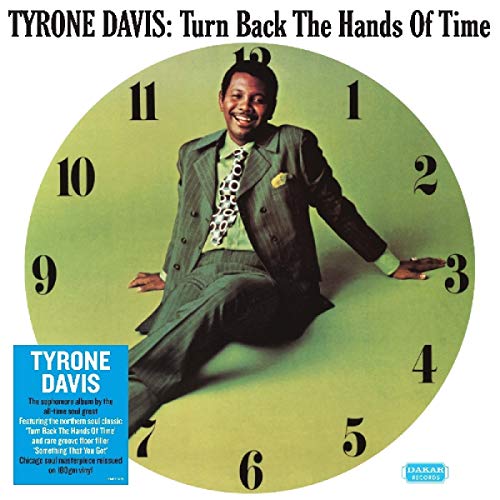 Tyrone Davis album cover featuring a man posed against a clock face.