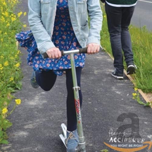 Child on a scooter with CD cover featuring band logo visible.