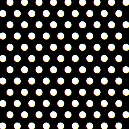 Black background densely covered in evenly spaced white polka dots.