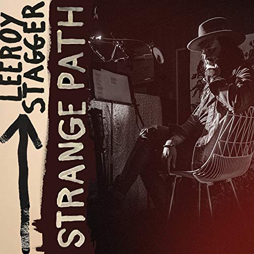 Album cover for Leeroy Stagger’s “Strange Path” featuring a musician.