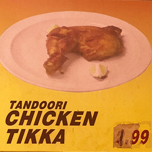 Tandoori chicken leg on a white plate with price tag below.