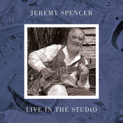 Spencer Jeremy album cover: a portrait of a man with a guitar.