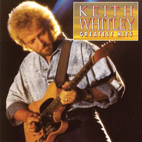 Keith Whitley album cover featuring the artist playing a guitar.