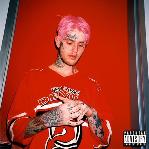Lil Peep with pink hair wearing a red New Jersey Devils jersey.