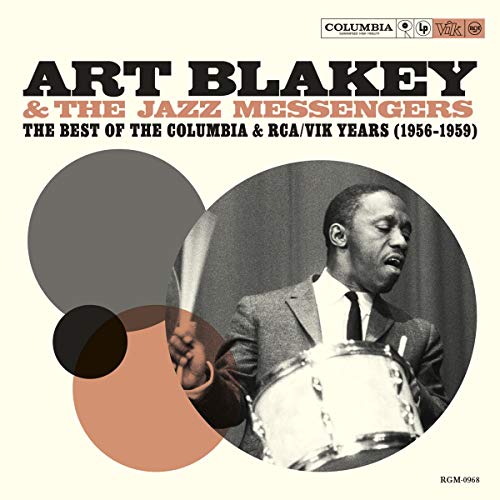 Art Blakey album cover featuring a drummer and abstract shapes.