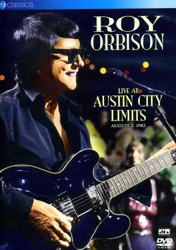 Roy Orbison playing a blue guitar on a DVD cover.