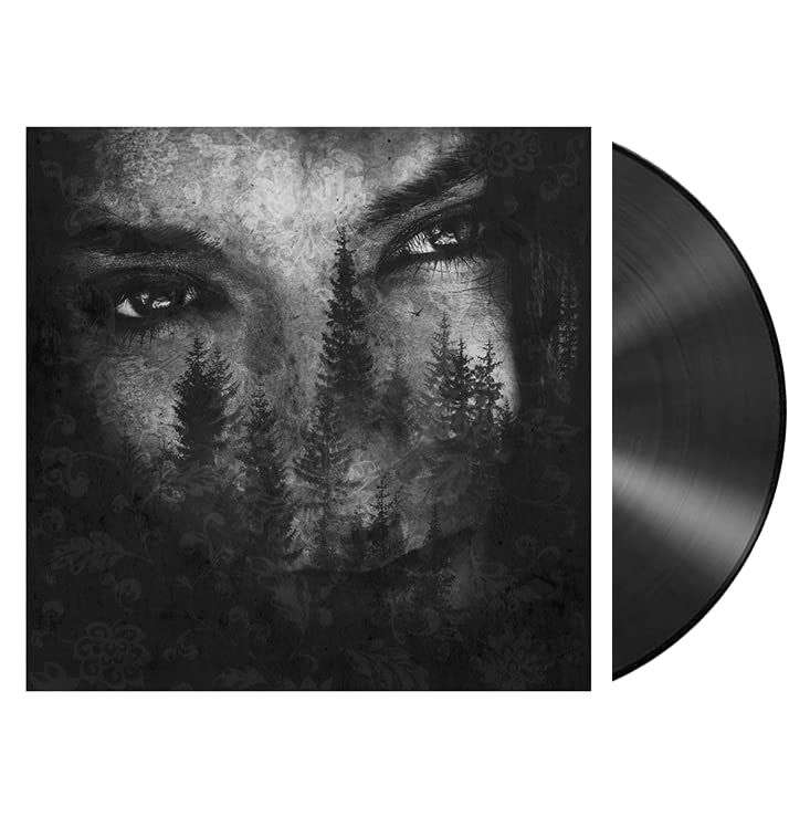 Silver vinyl record with cover art featuring a face and trees.