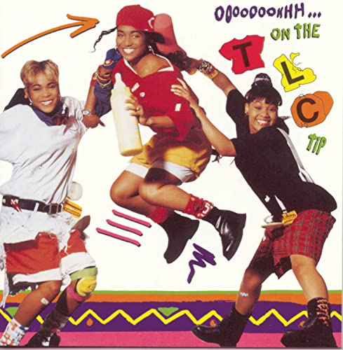 Corrs album cover featuring three women in 90s streetwear, jumping.