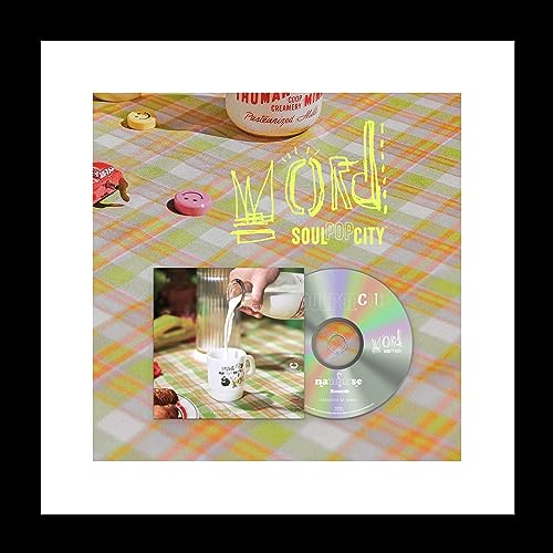 CD album cover featuring a hand pouring milk into a mug.