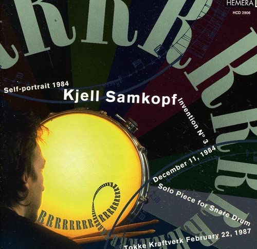 CD cover: portrait of a man beside a yellow snare drum.