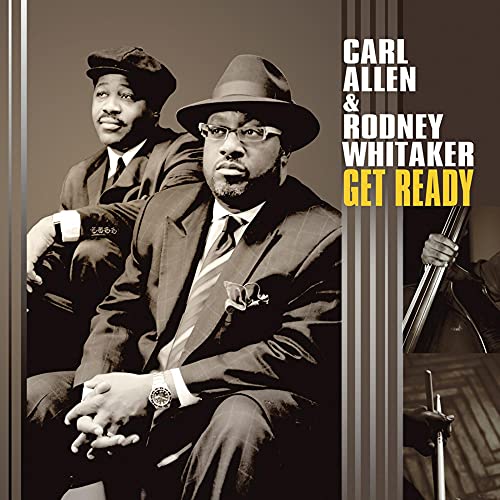 CD cover featuring two Black musicians in suits and hats.