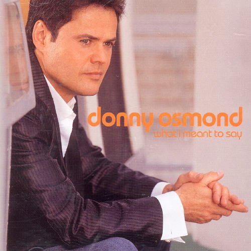 Donny Osmond album cover, portrait of singer in a suit.