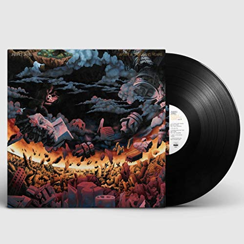 Vinyl record with album art depicting a dystopian, fiery landscape.