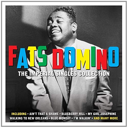 Fats Domino album cover, featuring a smiling portrait and colorful title text.