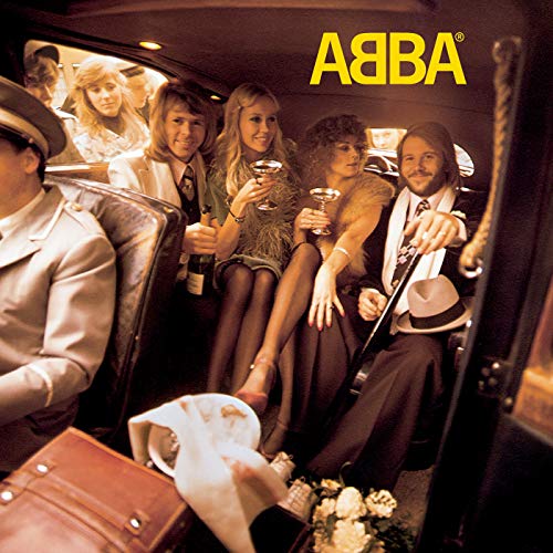 The four members of ABBA sitting inside a car holding glasses of champagne.