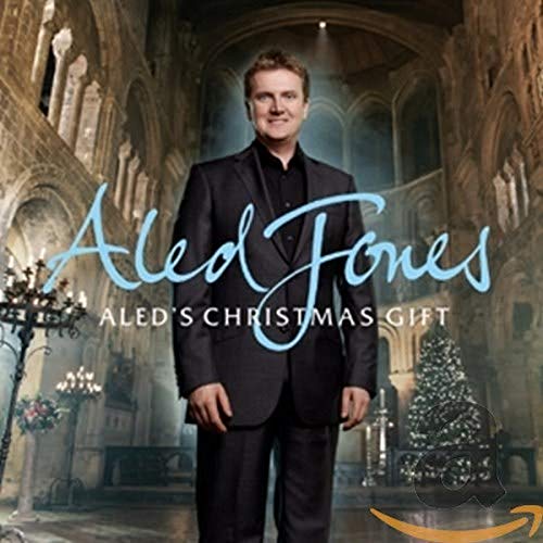 Aled Jones album cover, featuring him in a suit, with Christmas imagery.