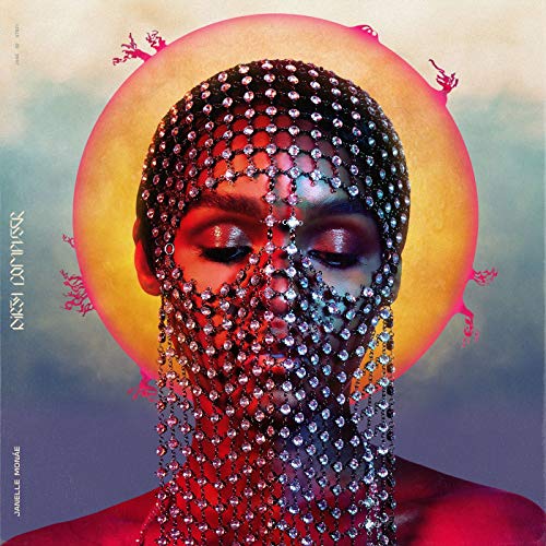 Janelle Monáe album cover, face obscured by a sparkling silver mesh veil.