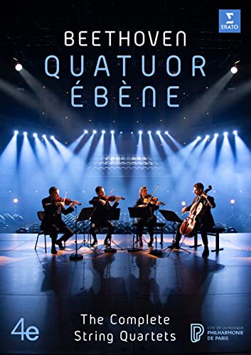 String quartet performing on stage under bright spotlights, DVD cover.