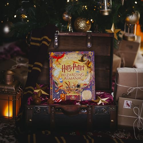“Harry Potter Wizarding Almanac” book displayed open in a vintage trunk.