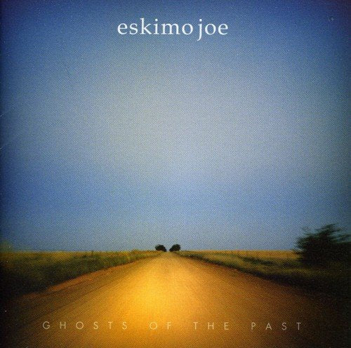 CD cover: a long, sunlit road under a vast blue sky.