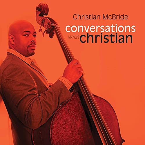Christian McBride with a double bass, album cover in orange tones.