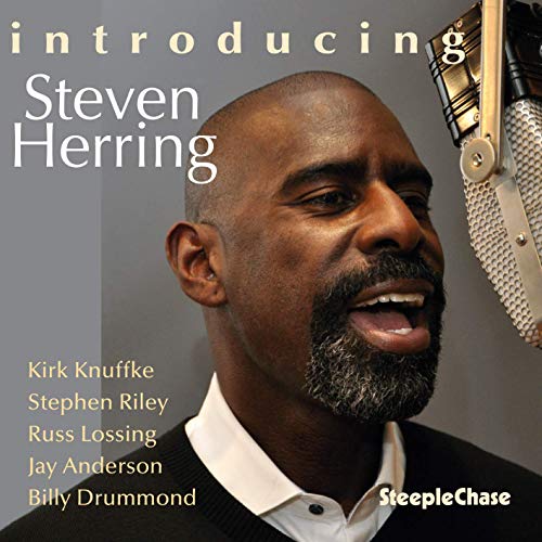 CD cover featuring singer Steven Herring with a vintage microphone.