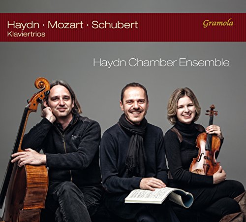 CD cover featuring three musicians with string instruments and sheet music.