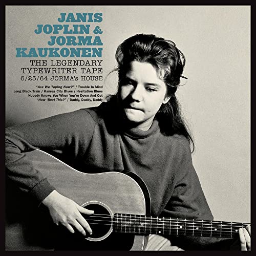Janis Joplin portrait with acoustic guitar on album cover.