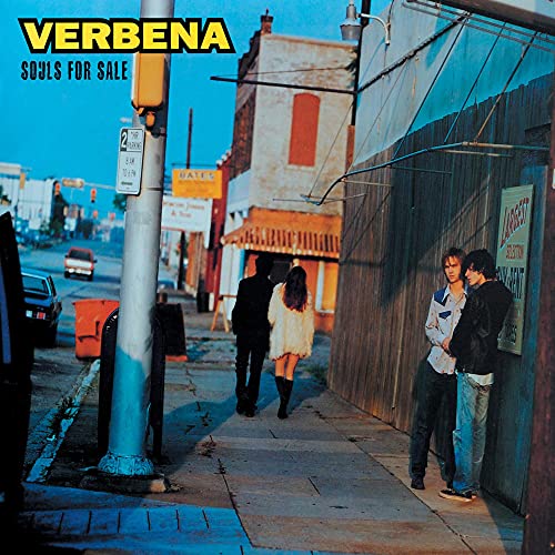 CD cover: two figures on a street with buildings and traffic.