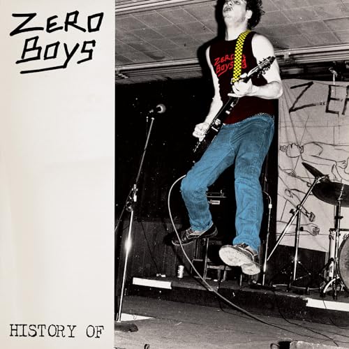 Black and white album cover featuring a guitarist jumping on stage.