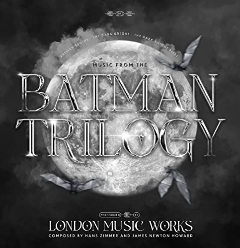 Batman Trilogy vinyl record cover with moon, bats, and silver lettering.