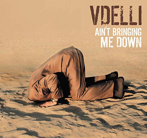 CD cover: person in suit kneeling in sand, text "Vdelli - Ain't Bringing Me Down".