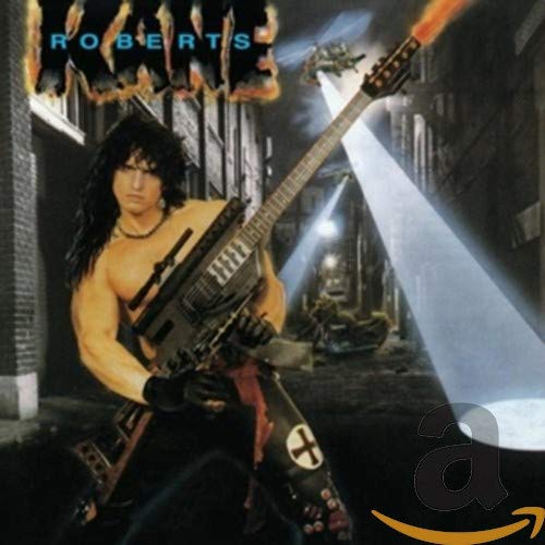 Kane Roberts album cover featuring a guitarist in an urban setting.