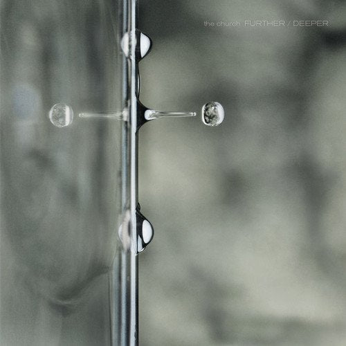 CD cover for The Church’s “Further/Deeper” with abstract silver cross imagery.