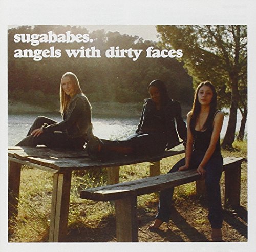 CD cover: Sugababes, three women sitting on a wooden bench outdoors.