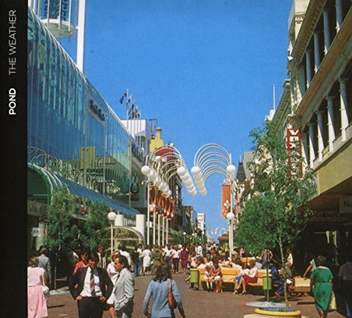 CD cover: a sunny street scene with many people walking.