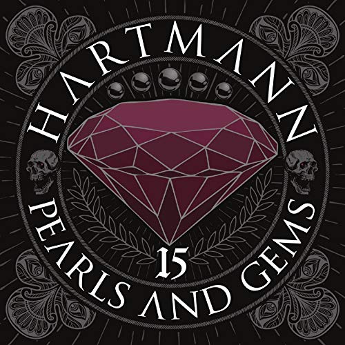 CD cover with a large ruby, pearls, skulls, and ornate design.