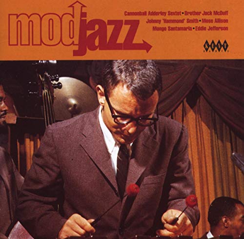 CD cover: jazz musician playing vibraphone, 1960s style, orange background.