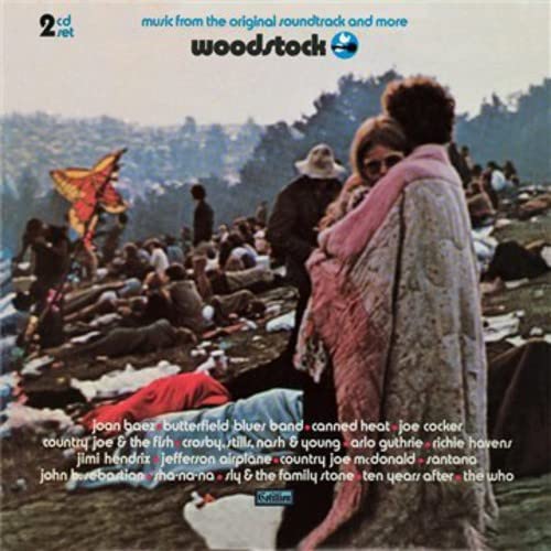 Woodstock album cover: crowd scene with butterfly and artist names listed.
