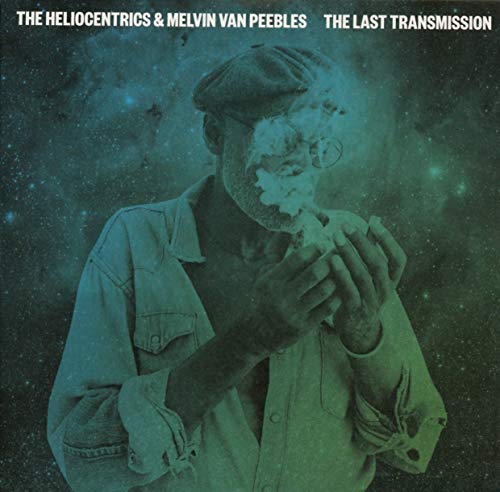 CD cover: man with cap, obscured face, teal and blue nebula background.