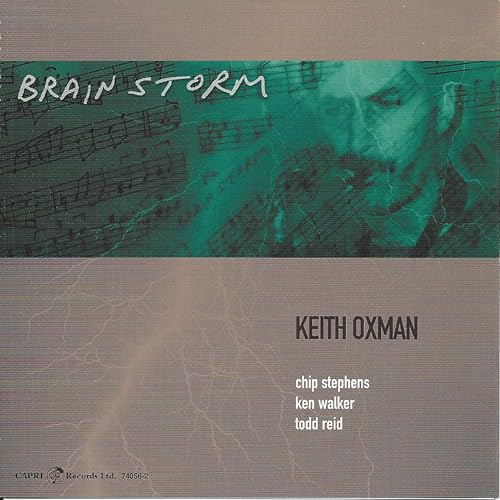 CD cover for Keith Oxman’s “Brainstorm” featuring a teal portrait.