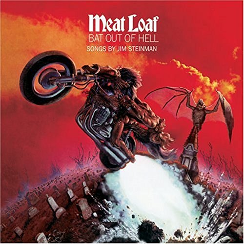 A person on a motorcycle crashes through a graveyard under a red sky.