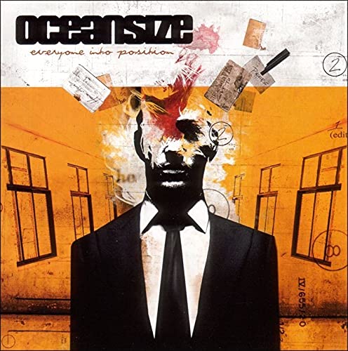 Album cover featuring a man in a suit with a blurred, abstract head.