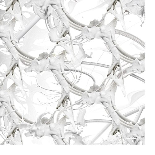 Abstract white sculpture of tangled cables and amorphous shapes.