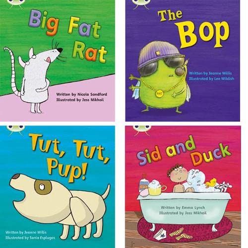 Four brightly colored children’s books with animal characters and simple text.
