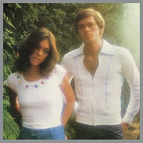 Carpenters duo portrait on album cover, soft focus, 1970s style.